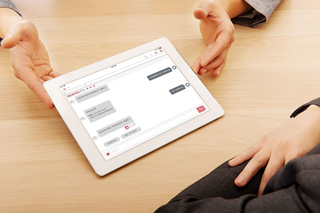 Business meeting-man showing something on tablet